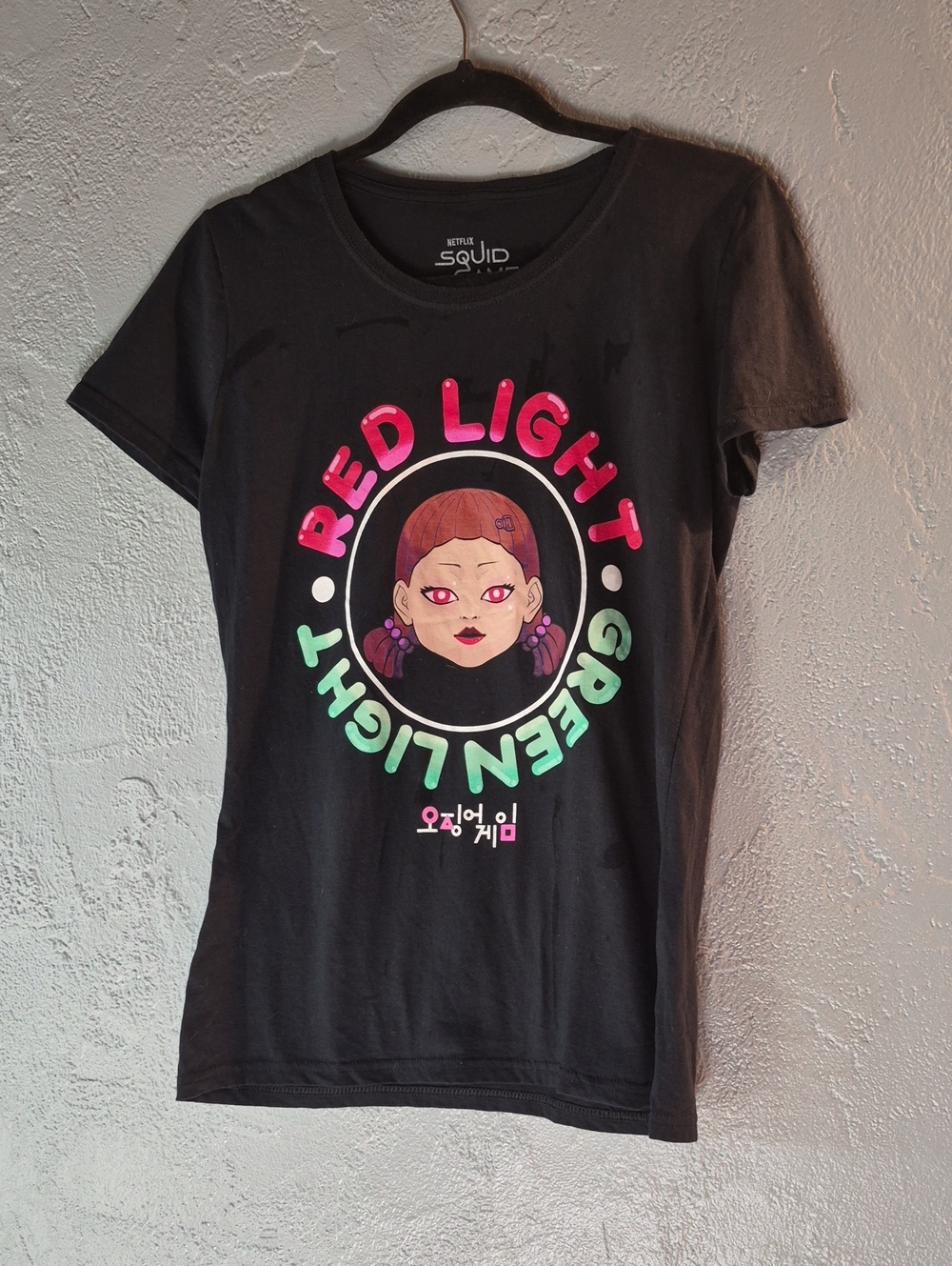 Netflix Black Tee with Pink and Mint 'Red Light Green Light' Graphic